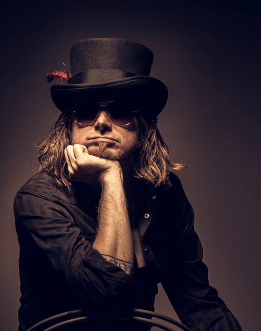 Man With Top Hat And Sunglasses