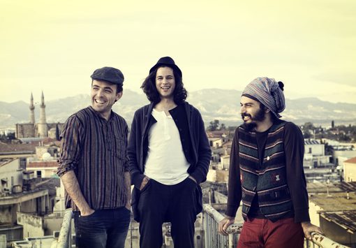 Three Men on Rooftop Terrace