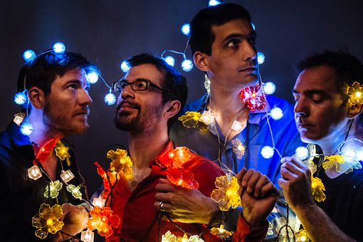 Four Men with String Lights